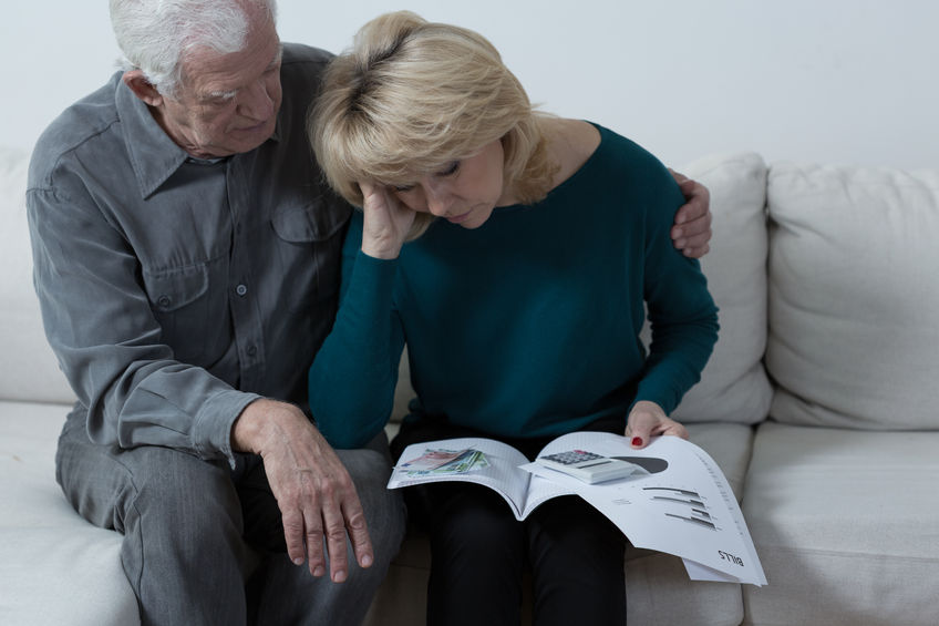 North Dakota Probate Process - elderly man comforting his adult daughter